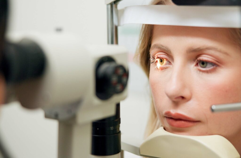 A patient undergoes a slit lamp exam to assess the severity of their dry eyes.